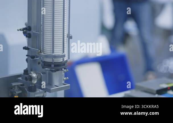 Paper cups transported on automated conveyor belt inside modern ...