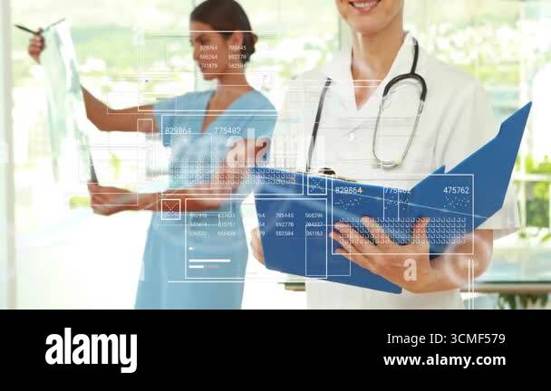 Nurse holding X-ray film for patient diagnosis and doctor flipping file ...