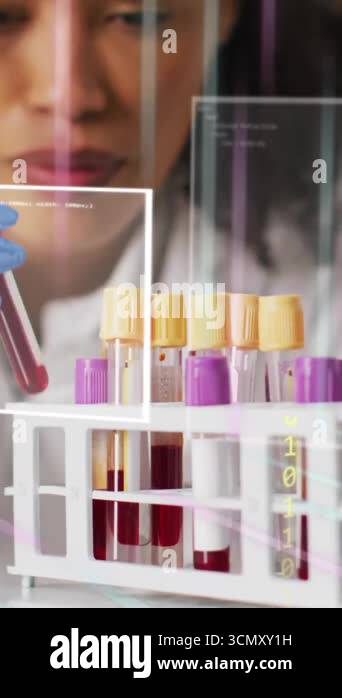 Analyzing blood samples, scientist with test tubes over digital data ...