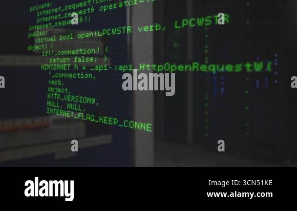 Opening shot revealing green C++ code scrolling through blocks while ...