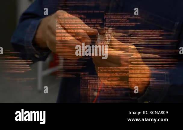 Technician handling sensor in tech workshop, unscrewing cap and ...