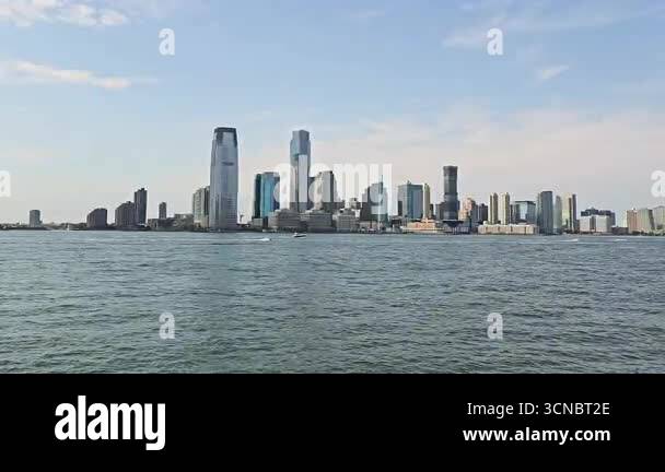 Picture of Modern Jersey City skyline across Hudson River. Panoramic view of ...