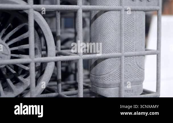 Object printed on 3D printer from molten plastic powder close-up. Model ...