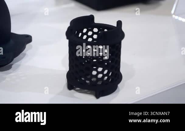 Object printed on 3D printer from molten plastic powder close-up. Model ...
