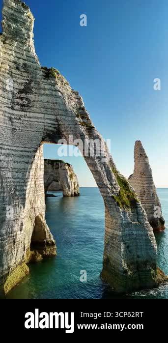Explore the breathtaking aerial view of the majestic cliffs of Etretat ...