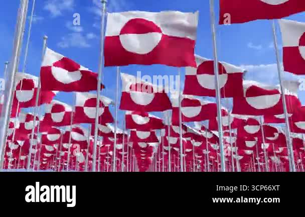 Greenland National flags waving in the wind on a clear day. Digital ...