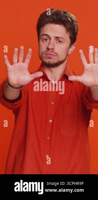 Stop, enough. Caucasian man say no hold palm folded crossed hands in ...