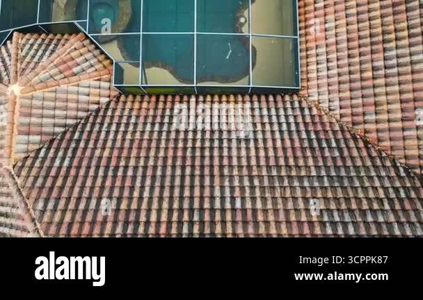 Roof inspection concept, Top down view of tiled roof on a Florida ...