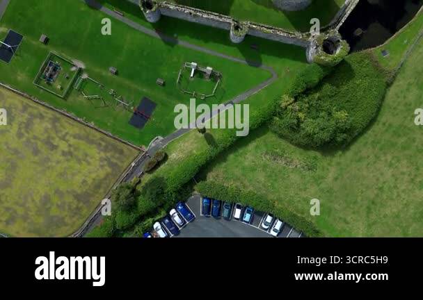 Aerial view of the medieval ruins of Beaumaris Castle in the coastal ...