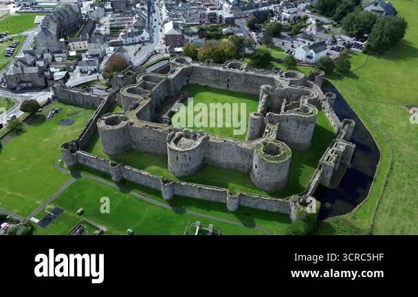 Aerial view of the medieval ruins of Beaumaris Castle in the coastal ...