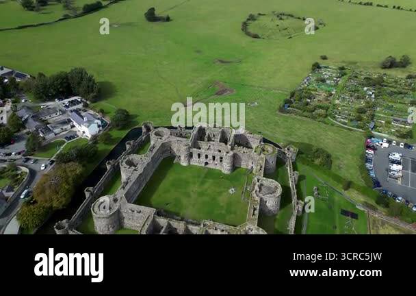 Aerial view of the medieval ruins of Beaumaris Castle in the coastal ...