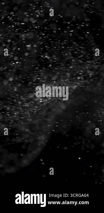 Atmospheric dust particles ambient on black screen overlay. Filmed with ...
