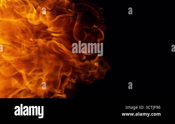 Super Slow Motion Shot of Fireball Transition Isolated on Black ...