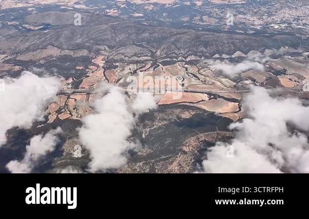 This aerial video showcases breathtaking views from an airplane ...