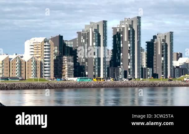Image showcasing Skyscrapers and contemporary buildings line the waterfront of Reykjavik ...
