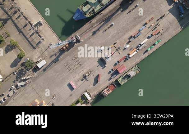 Aerial top down fly over view harbor Cargo port quay with container ...