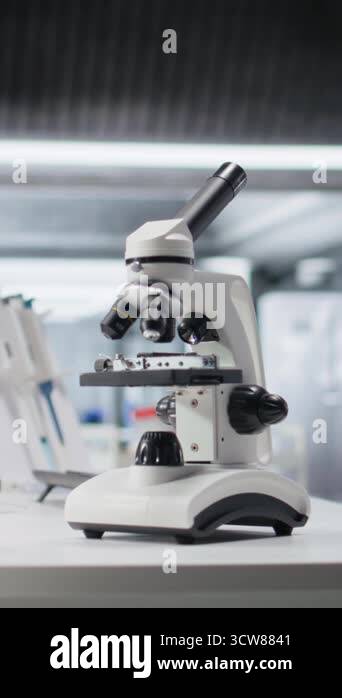 Bioscience Microscope Vertical Video Microscope tool placed on desk in laboratory for ...