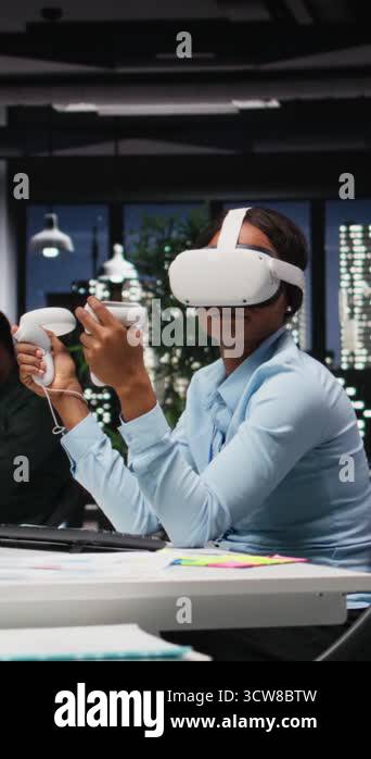 Vertical Video Female office worker using VR headset with artificial ...