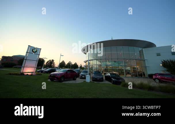 BMW dealership on twilight sky background. The BMW dealership ...