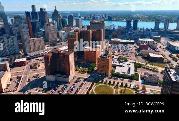 Multiple parking lots and parks around the high-rise buildings ...