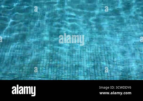 Flow Stream Pool Footage of water flow and stream circulating in a swimming pool, open ...