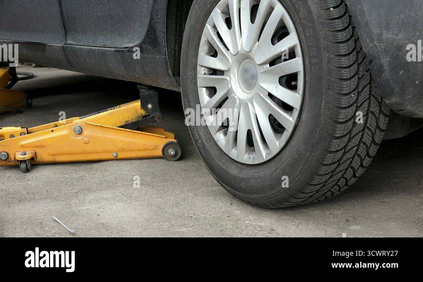 Jacking A Car For Tire Change