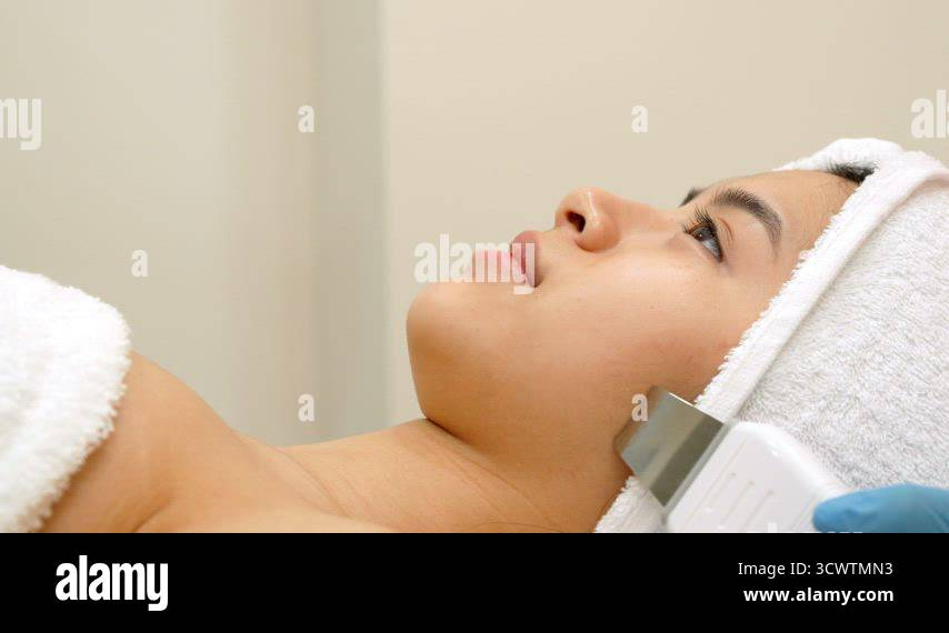 Physical therapist peels girl's cheek Stock Video Footage - Alamy