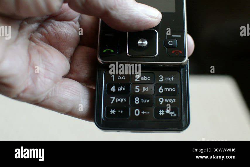 opening of nostalgic old cell phone and Typing/texting a message ,close ...