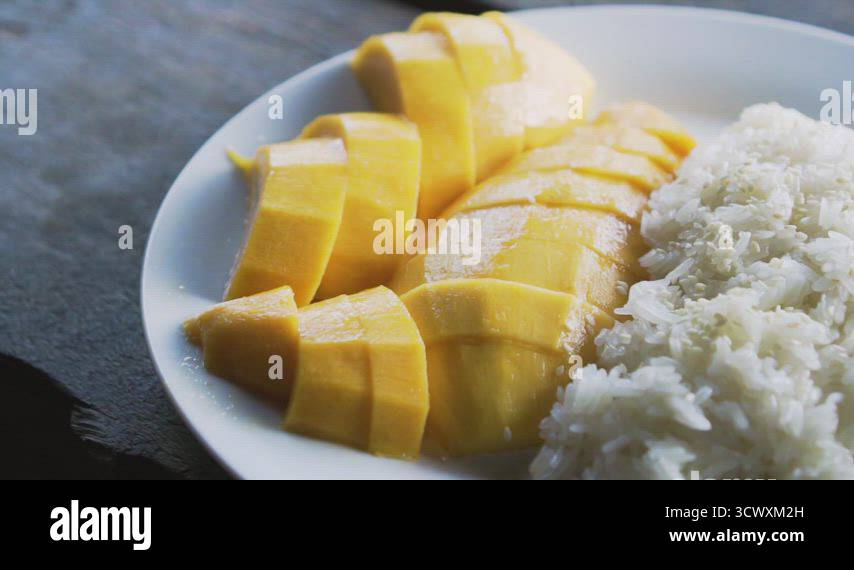 Sticky Rice 4k Thai mango sticky rice on Stock Videos & Footage - HD and 4K Video ...