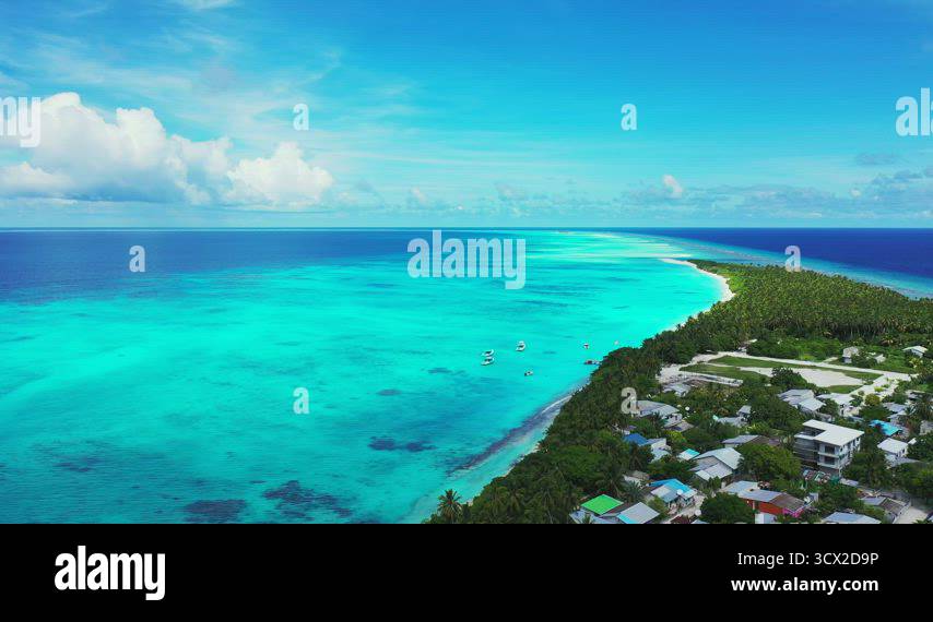 Beautiful above abstract shot of a white sandy paradise beach and blue ...