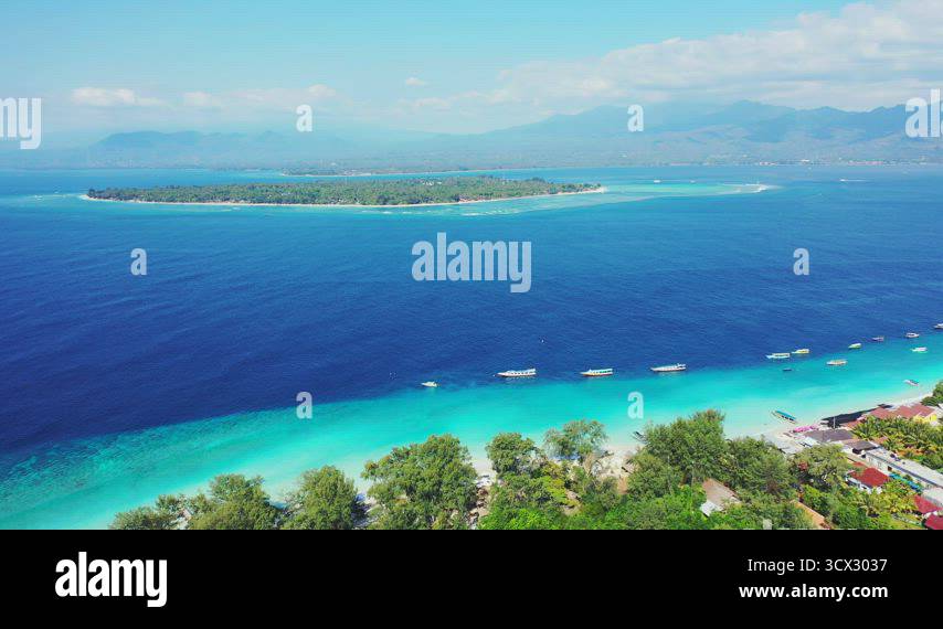 Wide angle overhead abstract view of a paradise sunny white sand beach ...