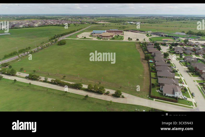 Aerial video of Sanger High School in Sanger Texas Stock Video Footage