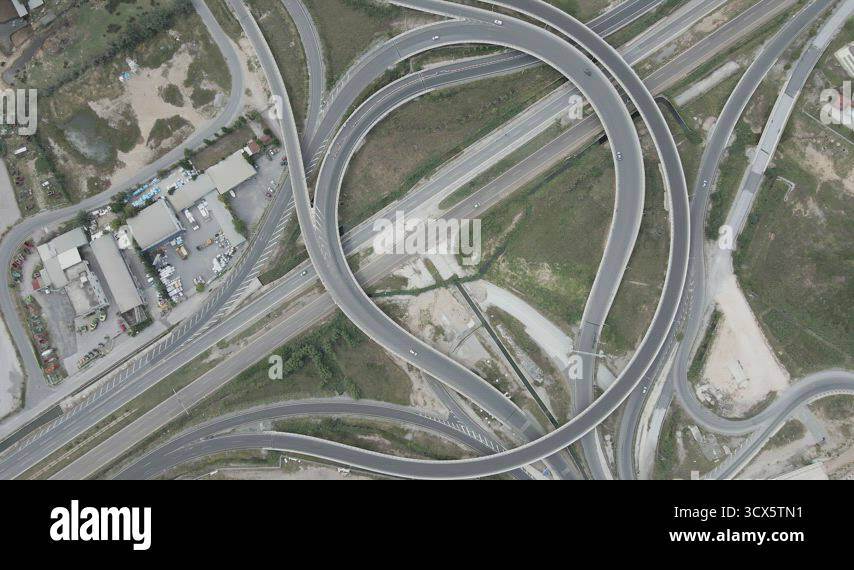 Aerial drone landscape of interchange traffic on a ring road with grade ...