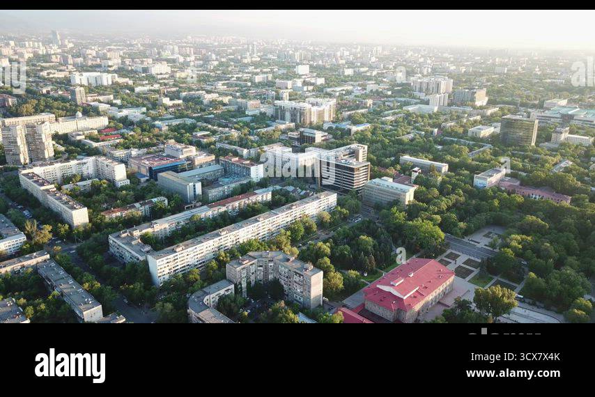 Clouds over mountains and city of Almaty at sunset Stock Video Footage ...