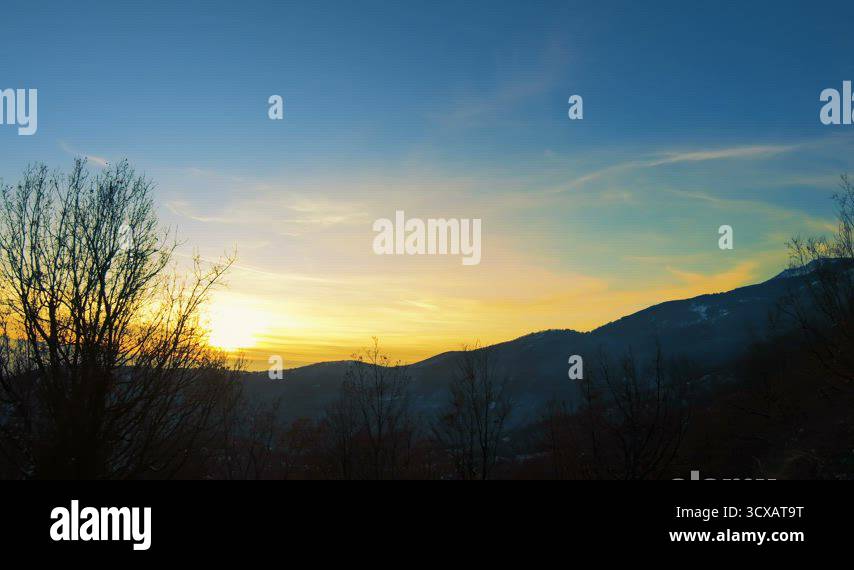 Adventure drive at mountain peaks in the dark colors of the sunset ...