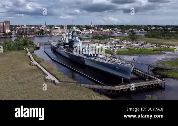 Low aerial view of the USS North Carolina BB-55 With Multiple Gun ...