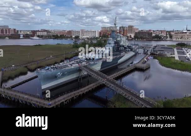 Low aerial view of the USS North Carolina BB-55 With Multiple Gun ...