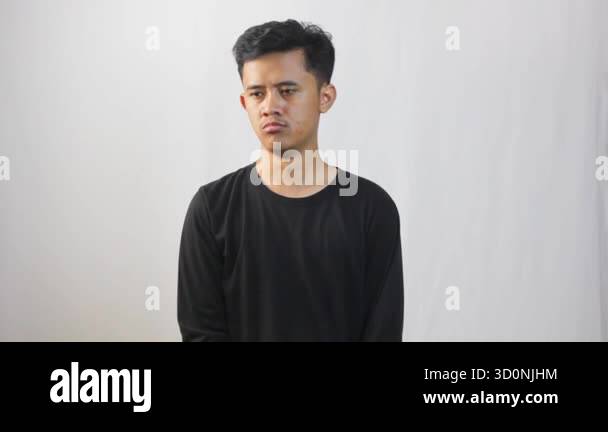 Asian man burping isolated on white background Stock Video Footage - Alamy