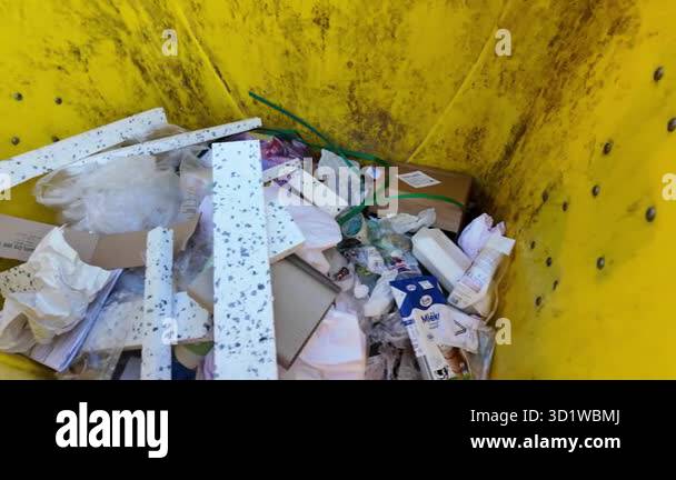 Trash Container Open A look inside open rubbish containers. An open container full of waste ...