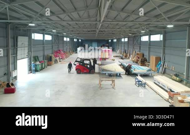 Valka, Latvia - October 29, 2025: Forklift moves through large