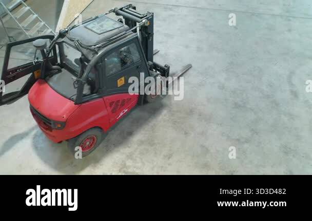 Valka, Latvia - October 29, 2025: Forklift navigates warehouse space ...