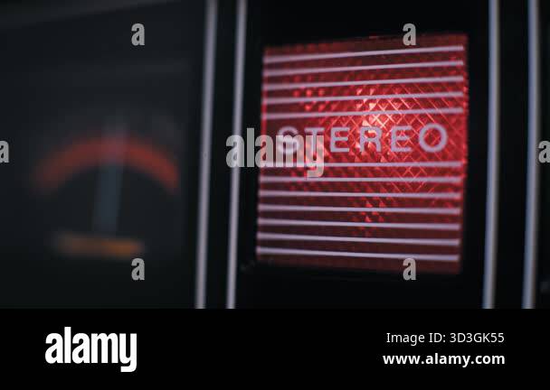 Vintage audio equipment detail with a flashing red stereo indicator ...