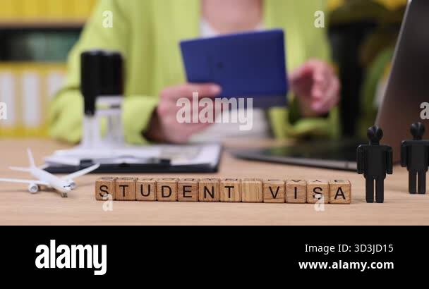In a bright study space, a student carefully manages important ...