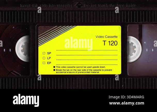 Old Video Cassette recorder playing a VHS Tape. Retro player, vintage ...