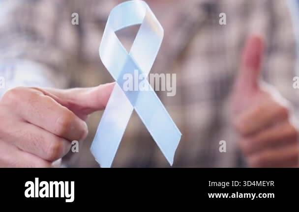Detailed macro shot of blue awareness ribbon symbolizing Movember and ...