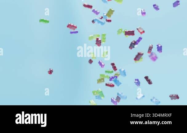 Colorful gummy bears tumble across a pastel surface in a stylized 3D ...