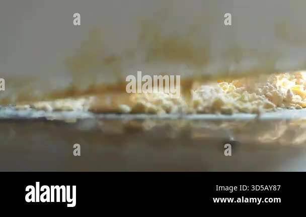 Close up of mixing shortening, flour, and salt together until very ...