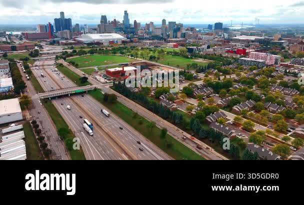 Detroit, USA, 28 July 2025: Wide-lane road with bridges above along the ...