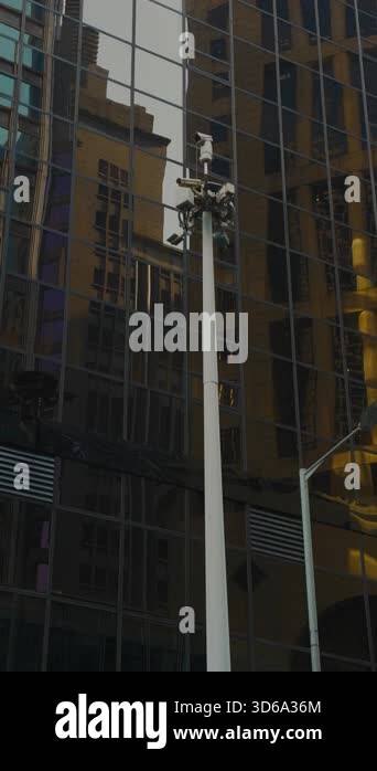 CCTV online cameras set on high pillar near corporate building on Hong ...