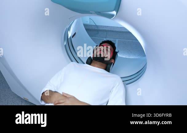 Positron emission tomography. CT or MRI scanner during machine imaging ...